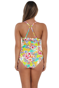 Back pose #1 of Taylor wearing Sunsets Botanical Bliss Sandbar Rib Serena Tankini Top showing crossback straps