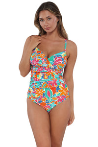 Active pose #1 of Taylor wearing Sunsets Festive Floral Sandbar Rib Serena Tankini Top