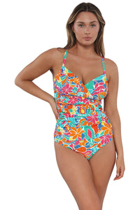 Front pose #1 of Taylor wearing Sunsets Festive Floral Sandbar Rib Serena Tankini Top