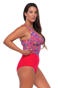 Side pose #1 of Nicky wearing Sunsets Rue Paisley Elsie Tankini Top lifted up to show matching Hannah High Waist bikini bottom