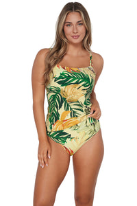 Front pose #1 of Taylor wearing Sunsets Amber Oasis Taylor Tankini Top lifted to show matching Hannah High Waist Bottom