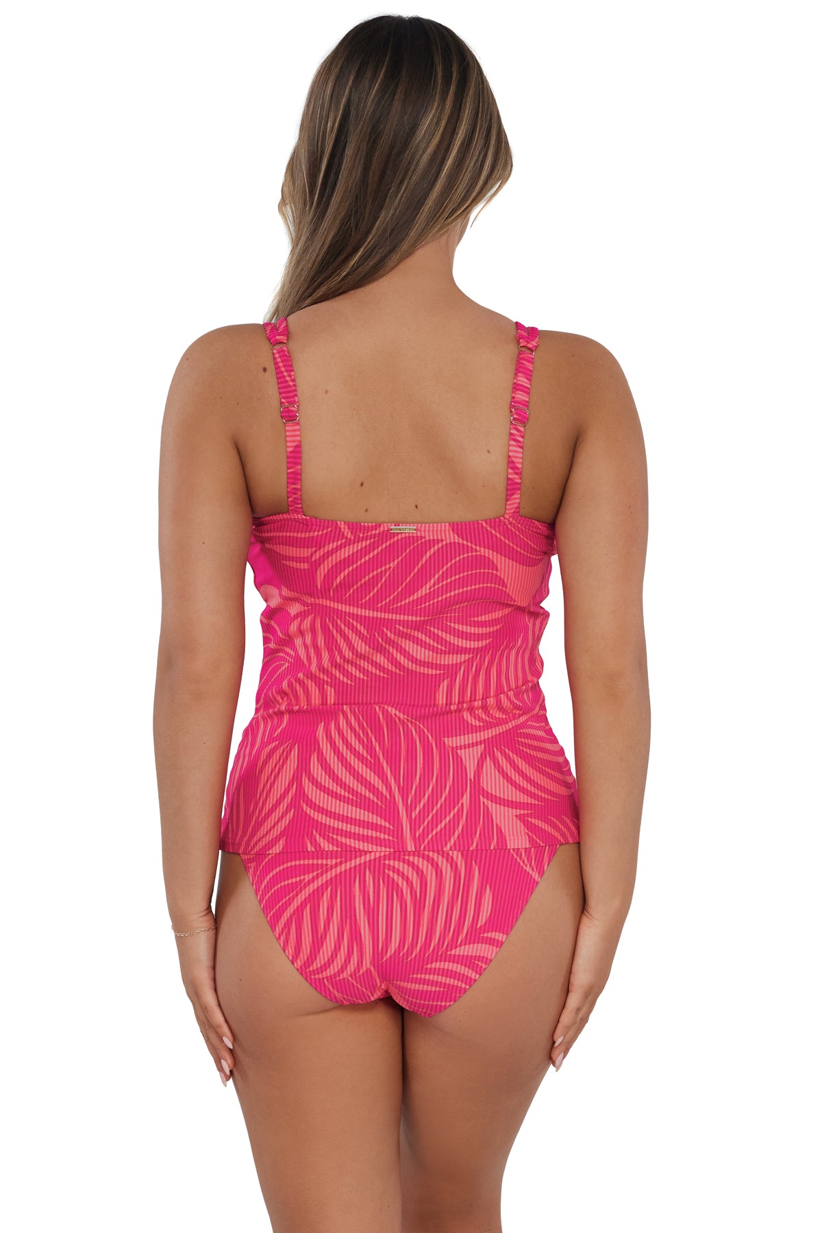 Back pose #1 of Taylor wearing Sunsets Blushing Palms Sandbar Rib Taylor Tankini Top