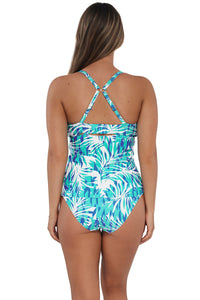 Back pose #1 of Taylor wearing Sunsets Sea Breeze Sandbar Rib Zuri V-Wire Tankini Top showing crossback straps