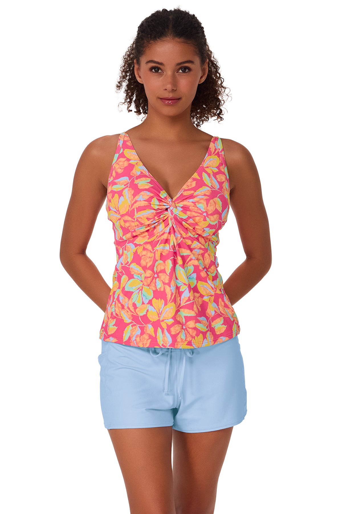Active pose #1 of Brita wearing Sunsets Magic Hour Crepe Forever Tankini Top