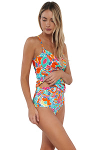 Quarter pose #2 of Jessica wearing Sunsets Festive Floral Sandbar Rib Simone Tankini Top