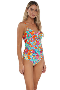 Quarter pose #1 of Jessica wearing Sunsets Festive Floral Sandbar Rib Simone Tankini Top