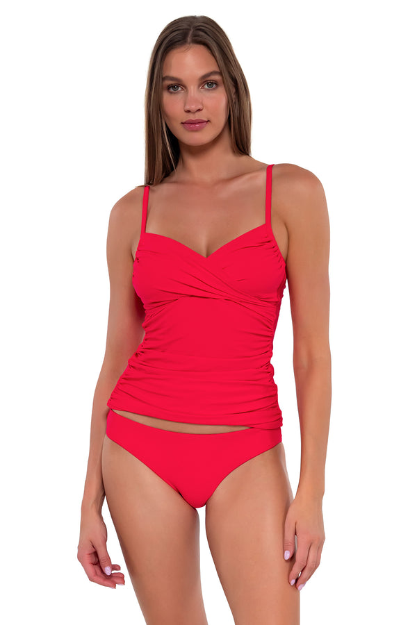 Front pose #1 of Daria wearing Sunsets Geranium Simone Tankini Top with matching Collins Hipster bikini bottom