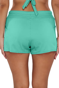 Back pose #1 of Nicki wearing Sunsets Escape Aqua Mist Sandbar Rib Laguna Swim Short