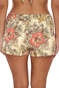 Back pose #1 of Nicki wearing Sunsets Escape Island Spice Laguna Swim Short