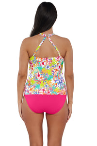 Back pose #1 of Nicki wearing Sunsets Escape Botanical Bliss Sandbar Rib Emerson Tankini Top showing crossback straps