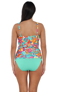 Back pose #1 of Nicki wearing Sunsets Escape Festive Floral Sandbar Rib Emerson Tankini Top