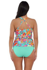 Back pose #1 of Nicki wearing Sunsets Escape Festive Floral Sandbar Rib Emerson Tankini Top showing crossback straps