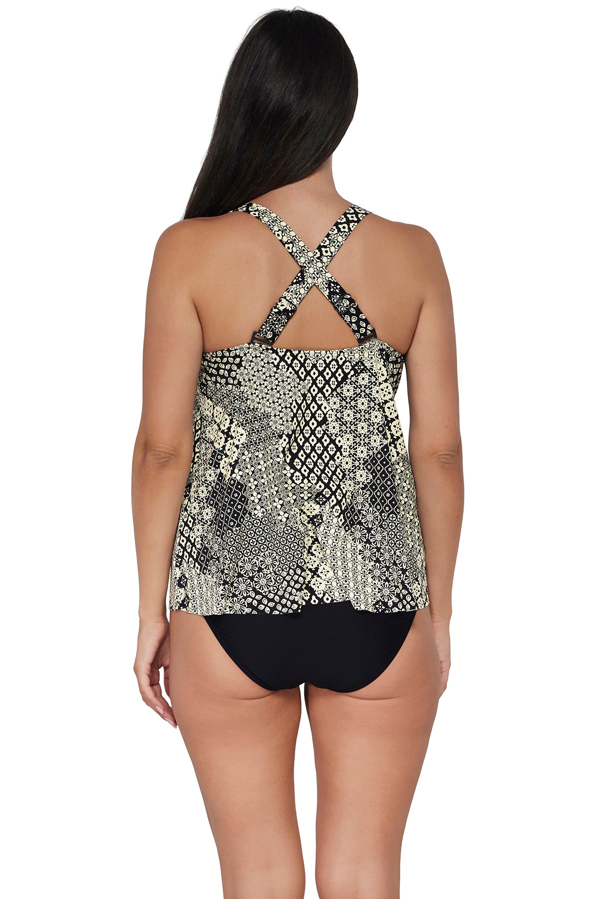 Back pose #1 of Nicki wearing Sunsets Escape Venice Seagrass Texture Sadie Tankini Top showing crossback straps paired with coordinating Black Hannah High Waist Bottom