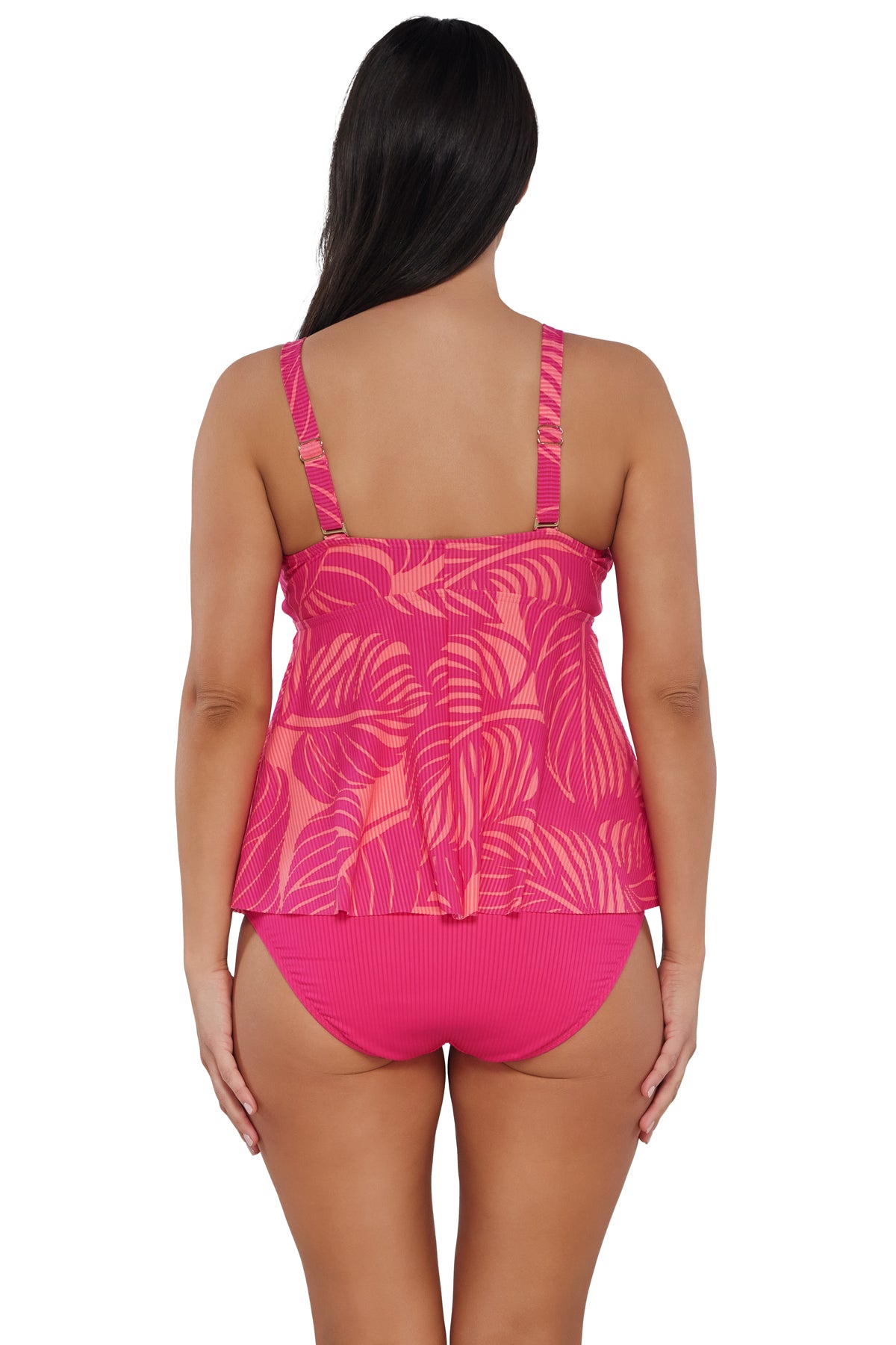 Back pose #1 of Nicki wearing Sunsets Escape Blushing Palms Sandbar Rib Marin Tankini Top