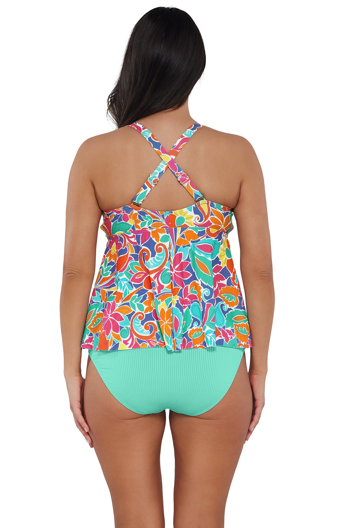 Back pose #1 of Nicki wearing Sunsets Escape Festive Floral Sandbar Rib Marin Tankini Top showing crossback straps