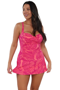 Active pose #1 of Nicki wearing Sunsets Escape Blushing Palms Sandbar Rib Sienna Swim Dress