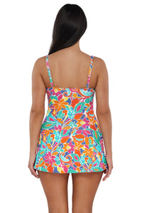 Back pose #1 of Nicki wearing Sunsets Escape Festive Floral Sandbar Rib Sienna Swim Dress