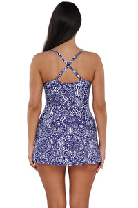 Back pose #1 of Nicki wearing Sunsets Escape Marina Sienna Swim Dress showing crossback straps