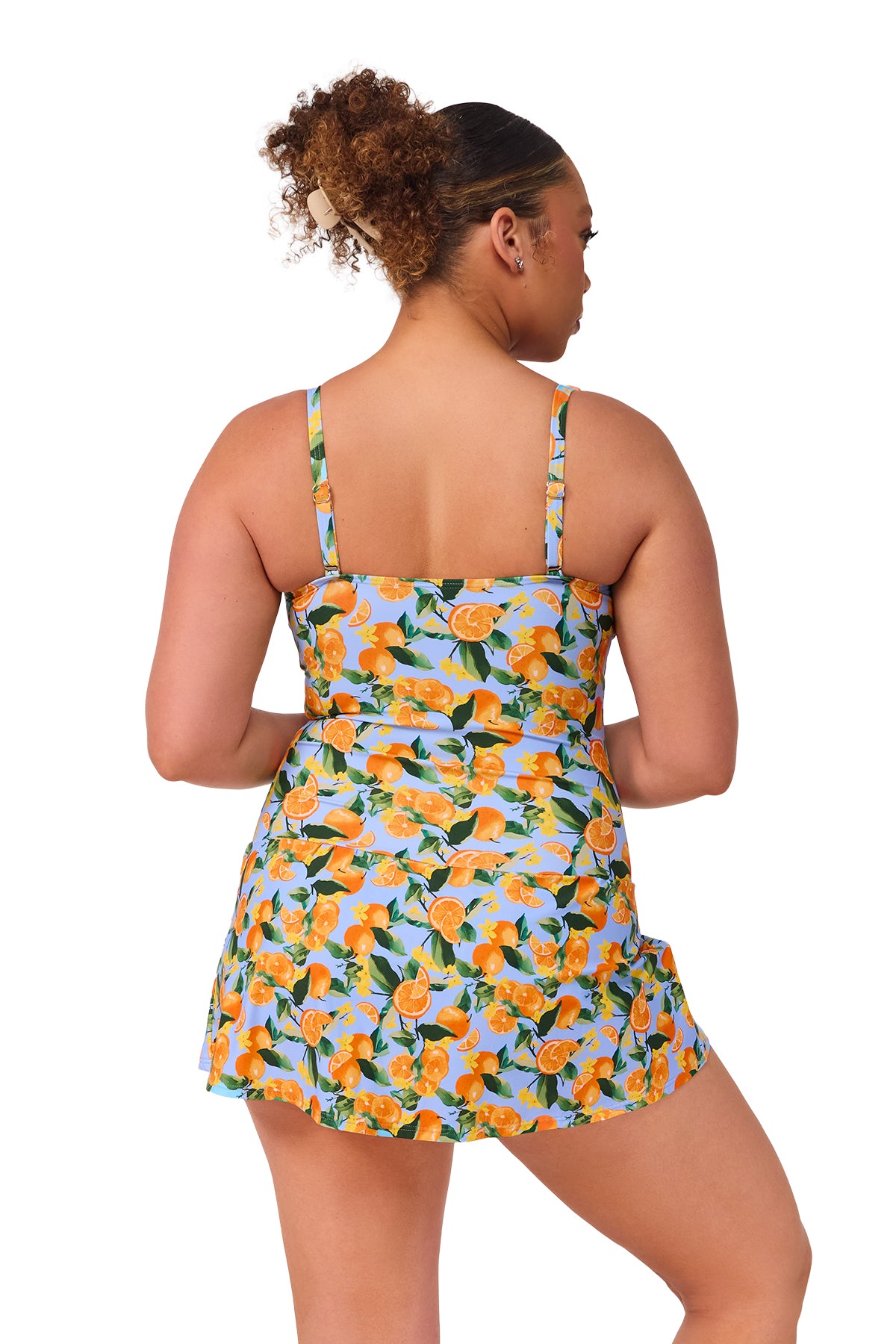 Back pose #1 of Haviland wearing Sunsets Escape Clementine  Sienna Swim Dress