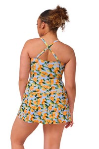 Back pose #1 of Haviland wearing Sunsets Escape Clementine Sienna Swim Dress showing crossback