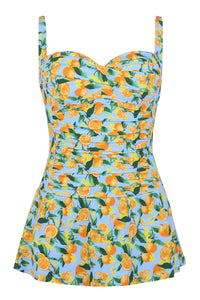 Front pose #1 of a floating garment shot featuring Sunsets Escape Clementine Sienna Swim Dress