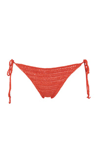 Front pose #1 of a floating garment shot featuring Swim Systems Fiery Red Crochet Evie Bottom