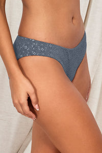 Quarter pose #2 of Jessica wearing Swim Systems Dusk Daisy Eyelet Chloe Bottom