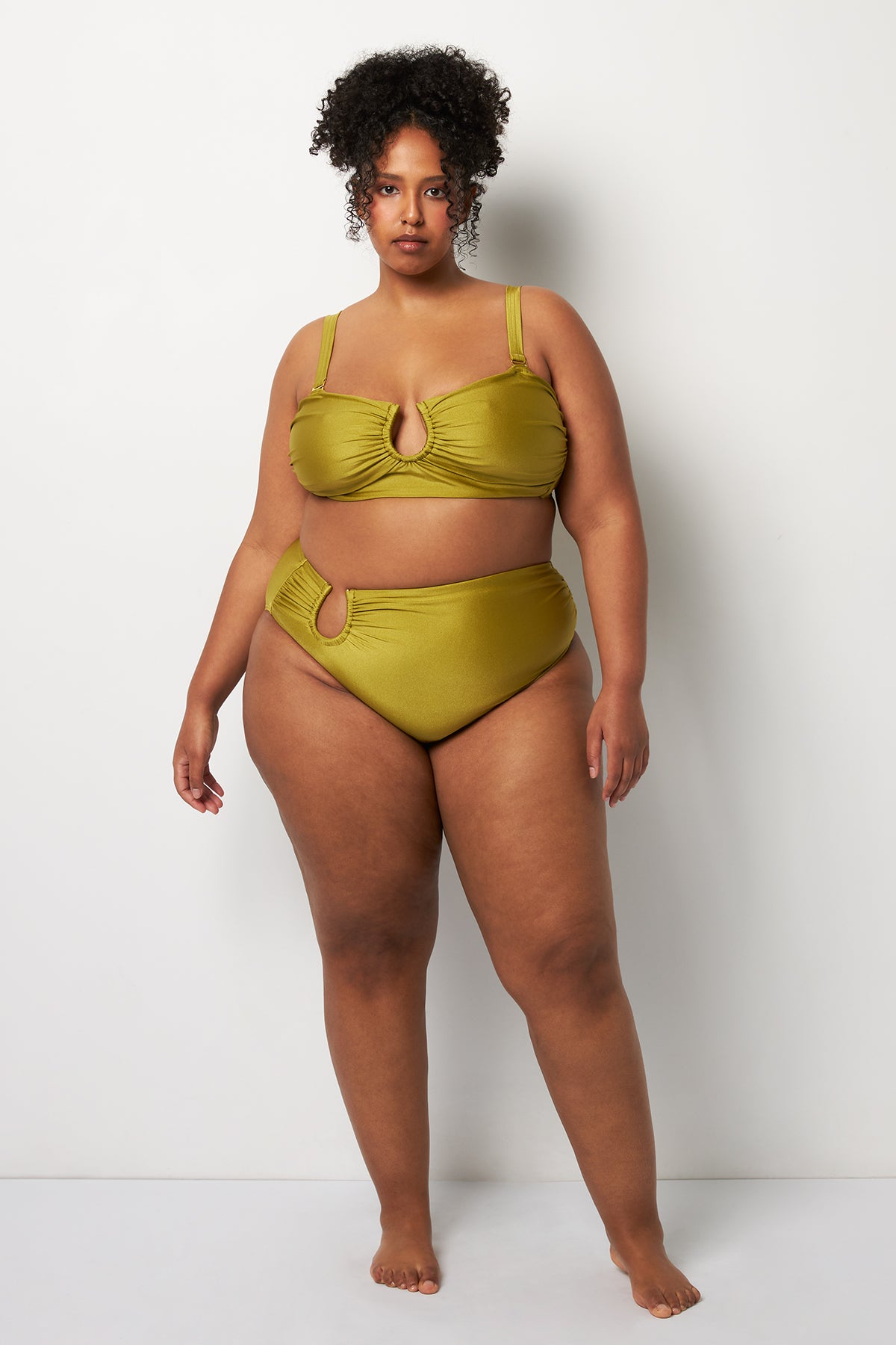 Front pose #1 of Lydia wearing Villa Fresca Shiny Olive Sofia Bikini Bottom paired with