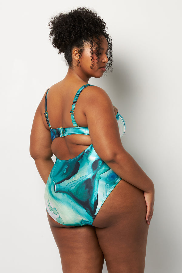 Back pose #2 of Lydia wearing Villa Fresca Tropic Ink Isla One-Piece