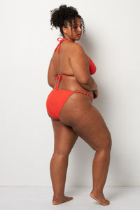 Back pose #1 of Lydia wearing Villa Fresca Spritz Sole Beaded Bikini Bottom paired with