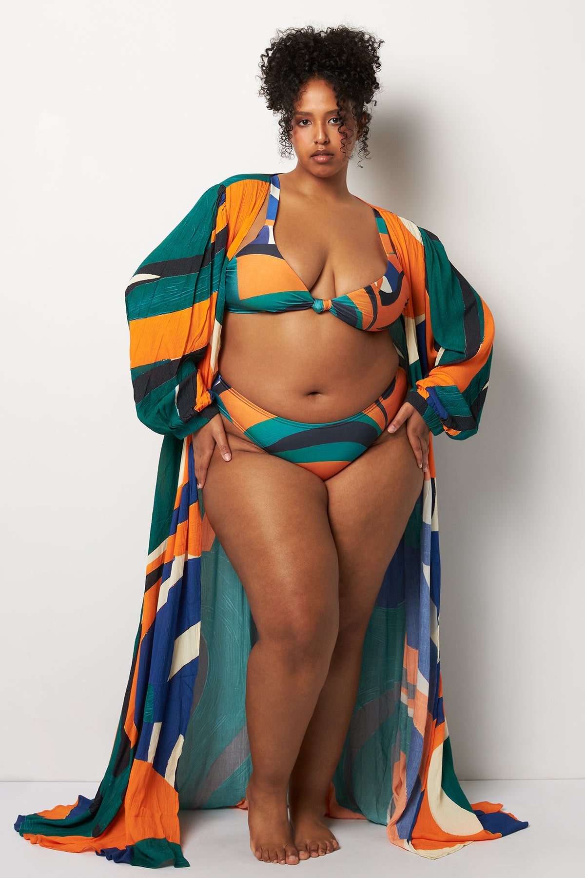 Front pose #2 of Lydia wearing Villa Fresca Tuscan Wave Serena Cover-Up paired with