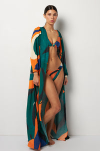 Side pose #1 of Alexa wearing Villa Fresca Tuscan Wave Serena Cover-Up paired with