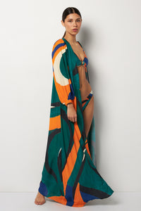 Side pose #2 of Alexa wearing Villa Fresca Tuscan Wave Serena Cover-Up paired with