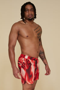 Quarter pose #1 of Jon wearing B Swim Trade Winds Bermuda Board Short 