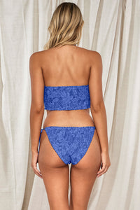 Back pose #1 of Jessica wearing Swim Systems Bahama Blues Kali Tube Top