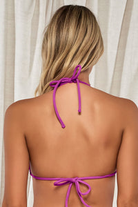 Back pose #1 of Jessica wearing Swim Systems Orchid Rio Rib Pom Pom Triangle Top