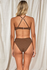 Back pose #1 of Jessica wearing Swim Systems Cocoa Daisy Eyelet Bonnie Top showing crossback straps paired with matching Malia High Waist Bottom