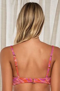 Back pose #1 of Jessica wearing Swim Systems Palm Fusion Rio Rib Annalee Underwire Top