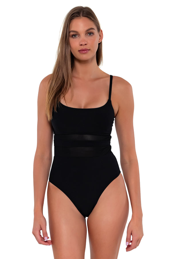 Front pose #2 of Daria wearing Sunsets Black Alexia One Piece