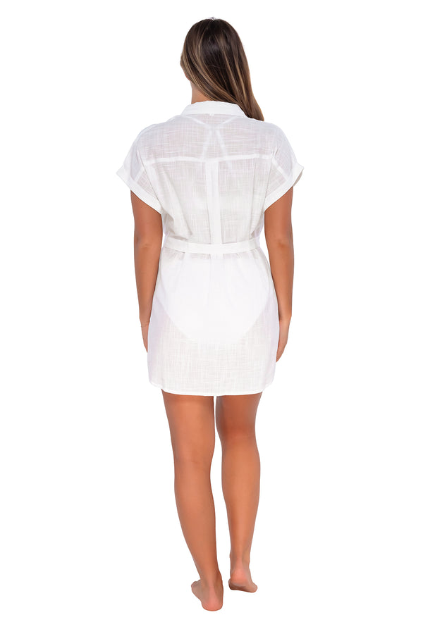 Back pose #1 of Taylor wearing Sunsets White Lily Lucia Dress