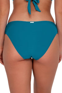 Back pose #1 of Taylor wearing Sunsets Avalon Teal Audra Hipster Bottom
