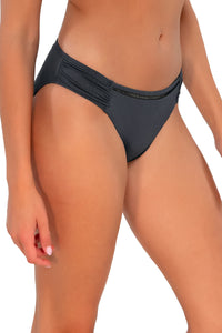 Side pose #1 of Daria wearing Sunsets Slate Seagrass Texture Audra Hipster Bottom