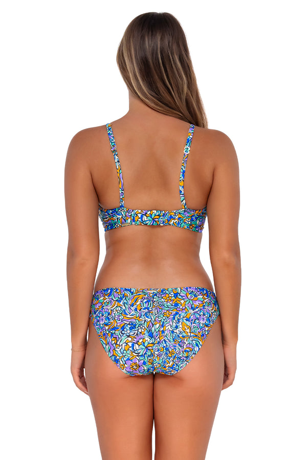 Back pose #1 of Taylor wearing Sunsets Pansy Fields Audra Hipster Bottom with matching Crossroads Underwire bikini top
