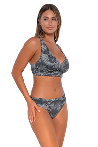 Side pose #1 of Taylor wearing Sunsets Fanfare Seagrass Texture Elsie Top with matching Unforgettable Bottom bikini