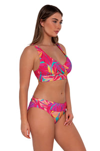 Side pose #1 of Taylor wearing Sunsets Oasis Sandbar Rib Elsie Top paired with Unforgettable Bottom swim hipster