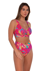 Side pose #1 of Taylor wearing Sunsets Oasis Sandbar Rib Summer Lovin' V-Front Bottom paired with Elsie Top bikini bralette