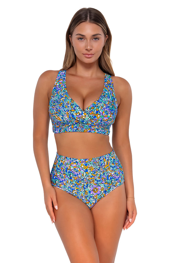 Front pose #1 of Taylor wearing Sunsets Pansy Fields Hannah High Waist Bottom with matching Elsie Top underwire bikini