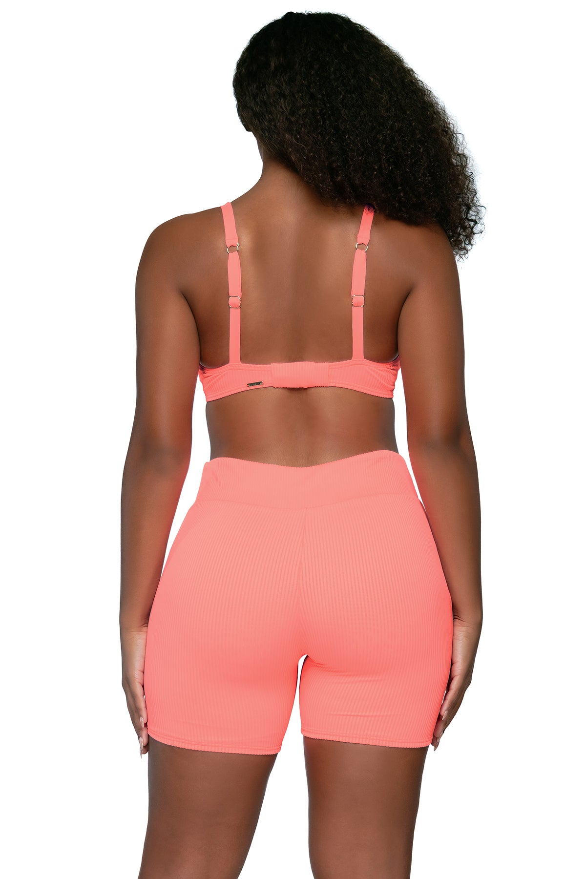Back view of Sunsets Escape Neon Coral Bayside Bike Short