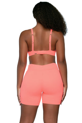 Back view of Sunsets Escape Neon Coral Bayside Bike Short