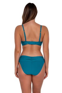 Back pose #1 of Taylor wearing Sunsets Avalon Teal Kauai Keyhole Top paired with Unforgettable Bottom swim hipster